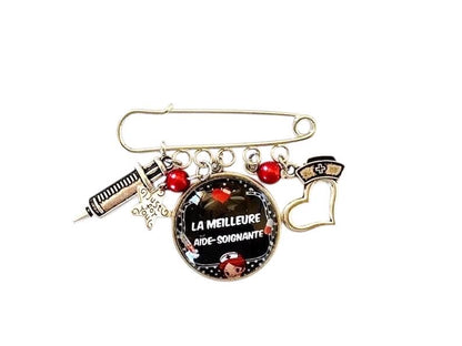 Broche cabochon pour aide soignante qui déchire