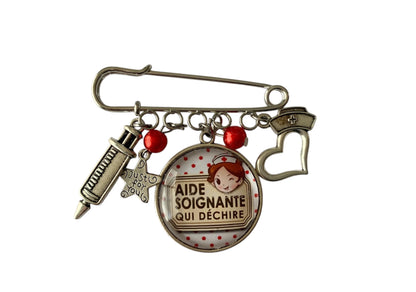 Broche cabochon pour aide soignante qui déchire