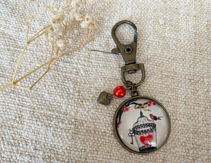 Porte clé, bijou de sac, bronze, cage, oiseau, romantique,  cabochon verre