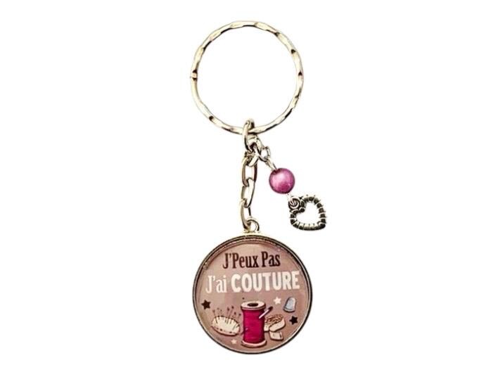 Porte clé cabochon "jpeux pas j'ai couture "