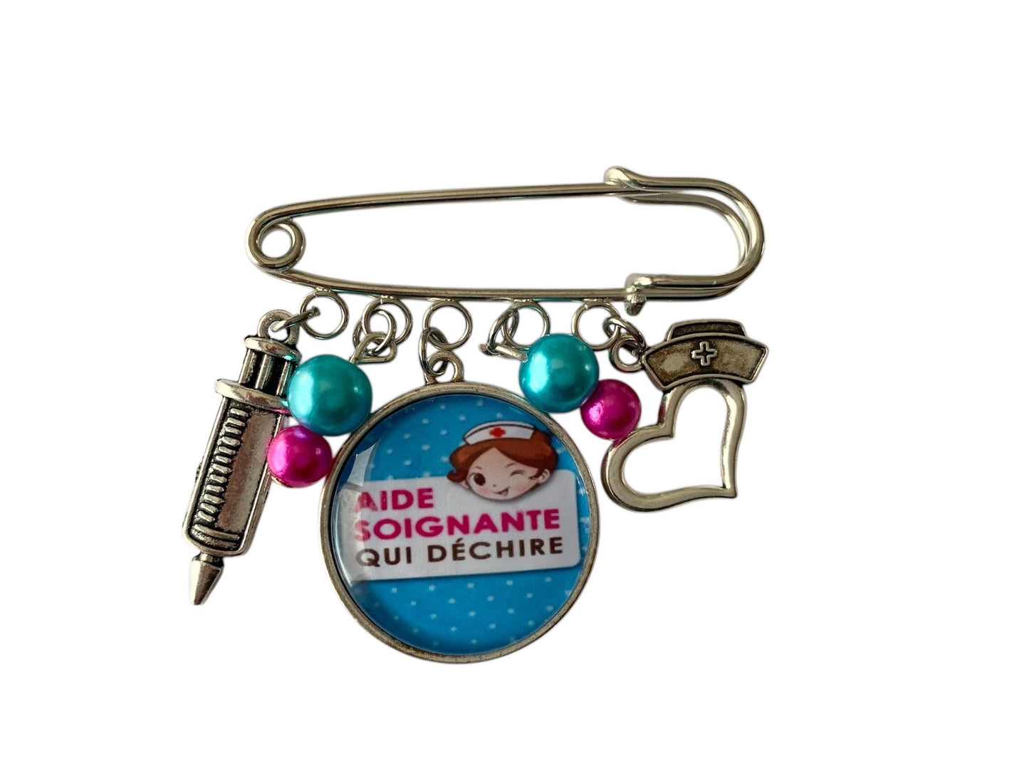 Broche cabochon pour aide soignante qui déchire