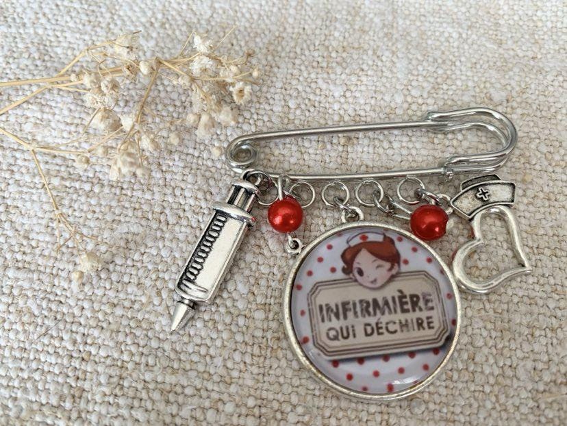 Broche cabochon pour infirmière qui déchire