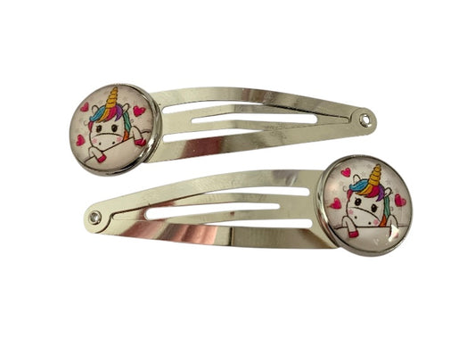 Paire de barrettes argentées, licornes