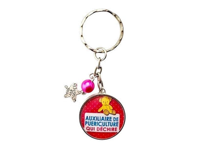 porte clé auxiliaire de puériculture qui déchire