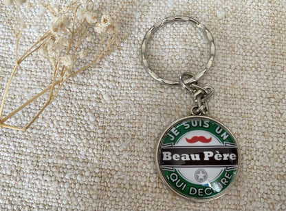 Porte clé cabochon "beau père qui déchire"
